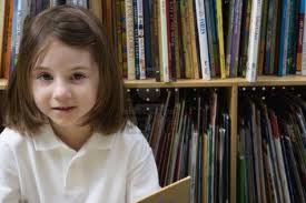 little girl in library