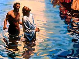 John baptizing Jesus in the Jordan River.