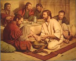 Jesus washing the feet of his disciples.